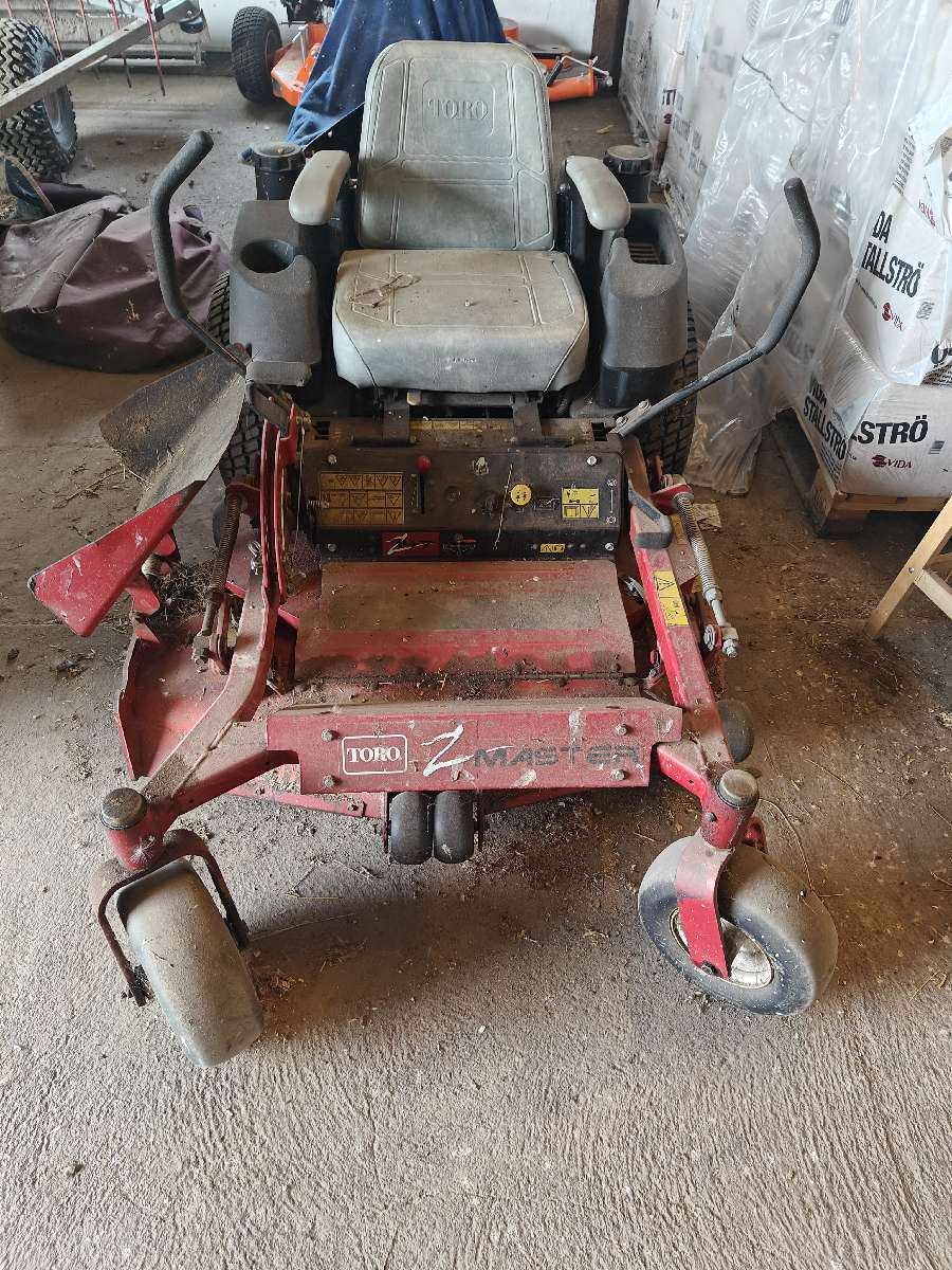Lej en Toro græsslåmaskine